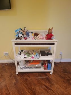 White baby changing station