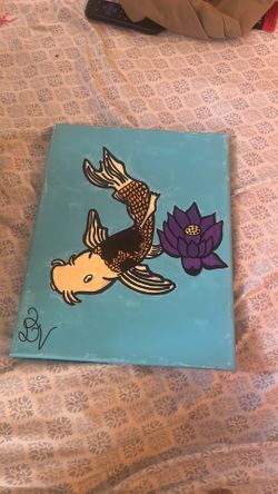 Koi fish with a lotus flower painting done with acrylic markers
