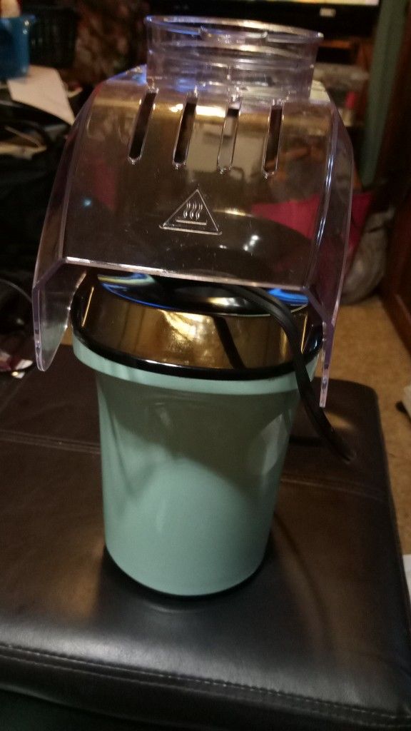 NEW UNUSED POPCORN MAKER.
