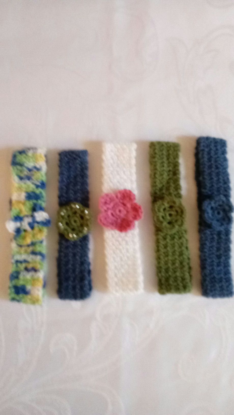 Baby girls head bands, hand crafted, made with cotton yarns, new, $1.00 each.