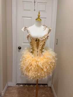 Stunning Gold & Cream Burlesque Showgirl Feather Corset Costume  Cream corset dress with gold fleur-de-lis embroidery and feathered skirt S/M c