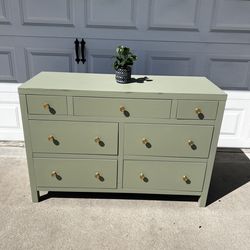 Sage green dresser with gold hardware