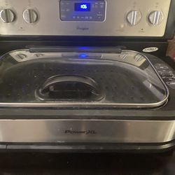 PowerXL Smokeless Grill with Tempered Glass Lid and Turbo Speed Smoke Extractor Technology.