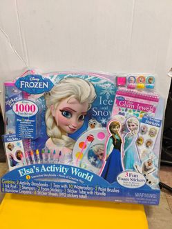 Disney Frozen Elsa's Activity World giant art collection playset featuring over 1000 items including storybooks, stickers, and watercolor paints.