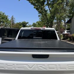 Chevy, black bed cover