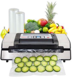 (Brand new in box) Nesco Vacuum Sealer with Bags and Rolls