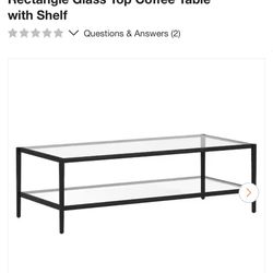 Hera 54 in. Blackened Bronze Rectangle Glass Top Coffee Table with Shelf