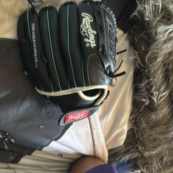 Rawlings black glove PROS series teal stitching basket web
