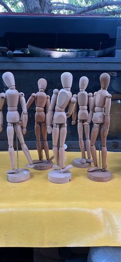 Five wooden modeling statues. $25 for all 5