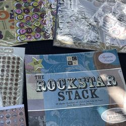 Scrapbooking kits, including  rock star stack and marine