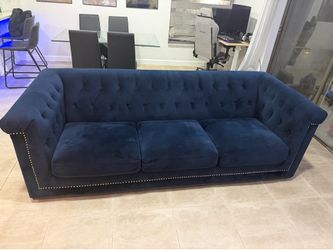 Blue velvet sofa