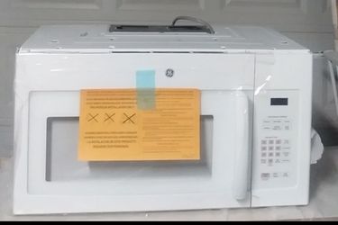 GE ..MICROWAVE NEW