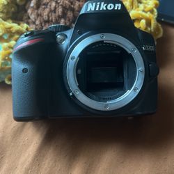 Nikon Camera And Lens 