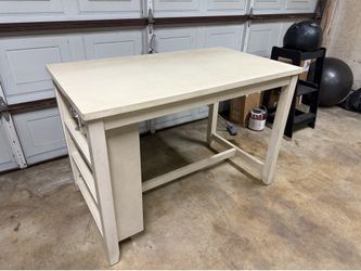 Off-white counter-height dining table with 4 stools.