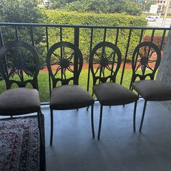 Stainless Steel Chairs with Sun Motif