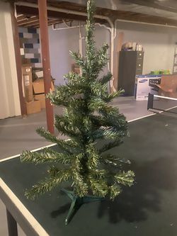 Brand new Plastic 24” tall Christmas tree