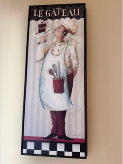 French themed wall decor and side table