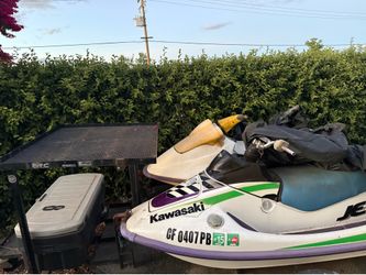 2 jet skis and trailer