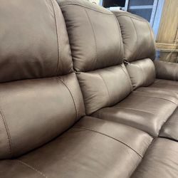 Power Reclining Sofa. Real Leather 
