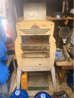 Working antique bread slicer