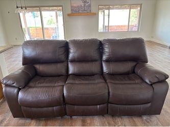 Moving sale!! Leather couch with reclining end seats