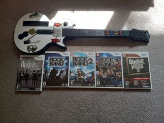 Nintendo Wii Guitar Hero Controller, microphone and 5 games