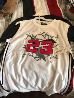 Brand new 2 shirts boys 14/16