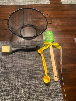 Lot of strainer and kitchen gadgets shower curtain hooks