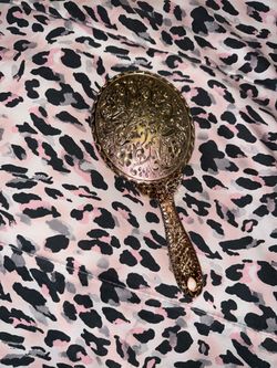 Gold vintage hand mirror