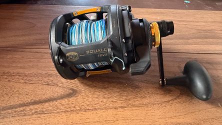 Penn squall 2 speed 16vs w Penn blue water fill roller rod