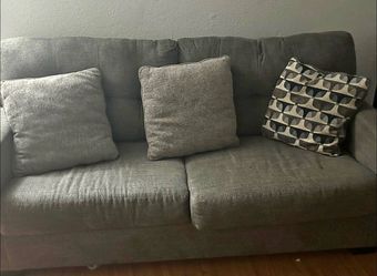Beautiful dark grey sofa couch