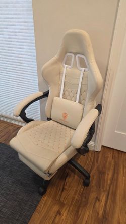 Gaming chair with leg extension and built-in speakers