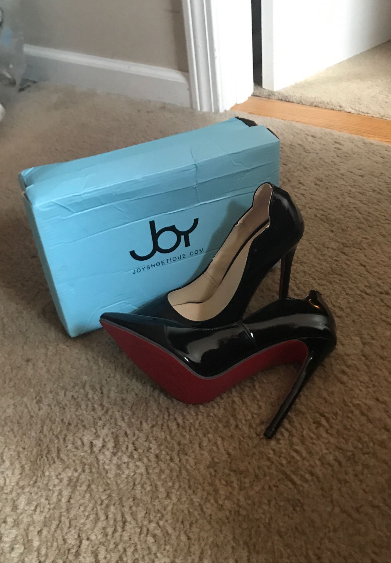 Joys black heels red bottom