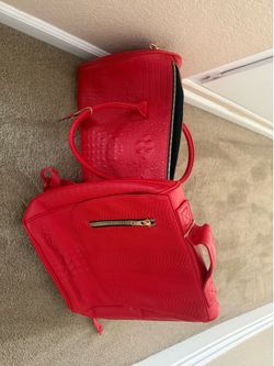 Red leather duffle and backpack
