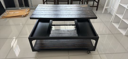 Coffee table lift top