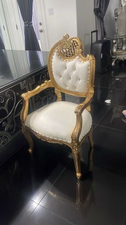 Eight Chairs With A Glass Table