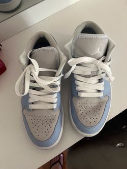 Jordan 1 Lows in a white/light blue/grey colorway