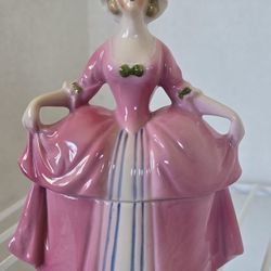 VTG Porcelain Trinket / powder box. Lady with light brown hair in Pink & blue stripped dress