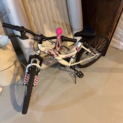 Pink, White, Black Mongoose Bike
