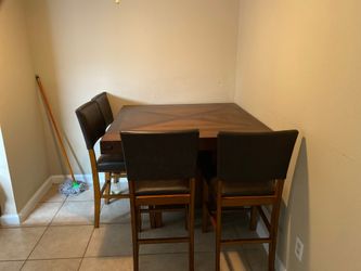 Kitchen table like new chairs are new