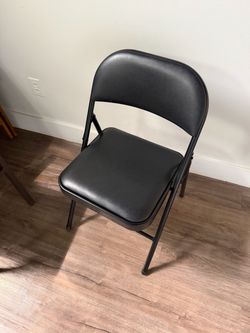 Black folding chair