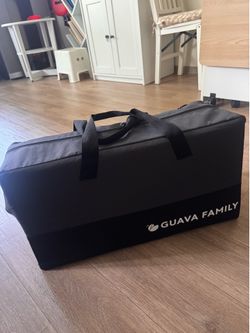 Guava Family Travel Crib Includes Lightweight Backpack Design