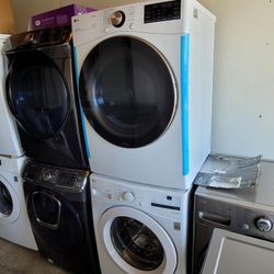 NEW LG Front Load Washer And Stackable Gas Dryer Set 