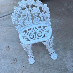 Vintage ornate aluminum and cast-iron chair