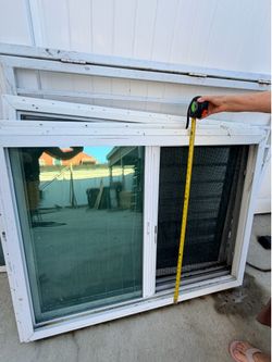 White vinyl sliding window 48”x36