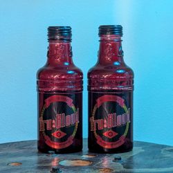 True Blood Collectible Glass Bottles Pair
