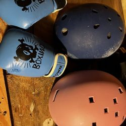 Kids Helmets And Pair Of Boxing Gloves 