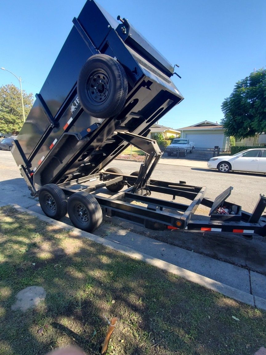 Trailer And Bobcat 