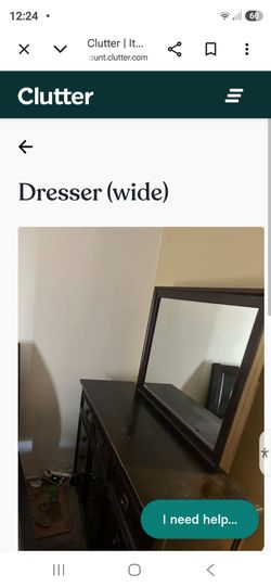 Wide dark brown dresser with multiple drawers and a matching rectangular framed mirror.