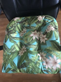 three cushions for chairs in perfect condition, like new ones, have a double-sided pattern